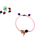 ''gold reddish swallow'' march bracelet