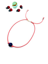 ''blue glass bead'' unisex march bracelet