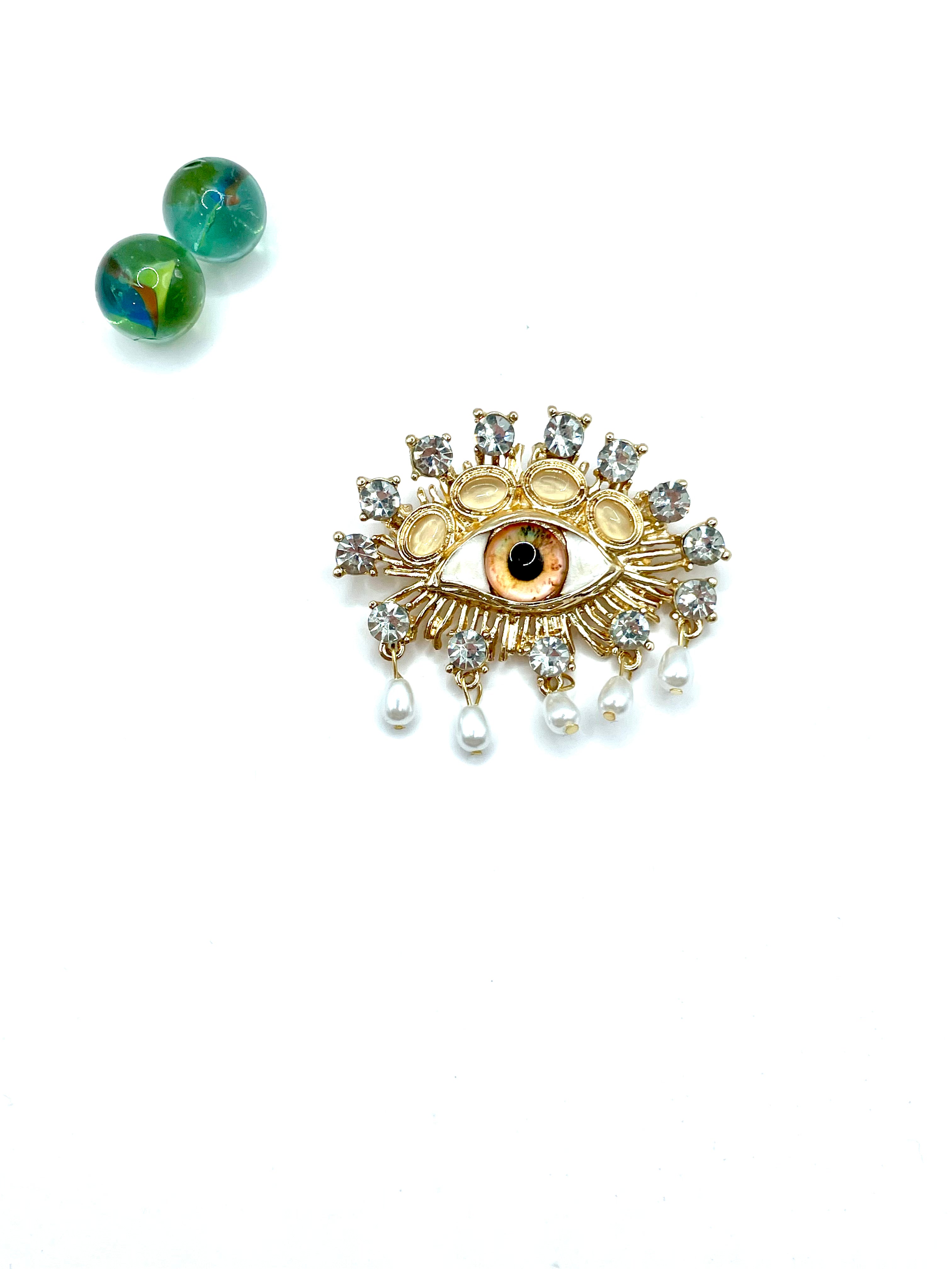Big brown ''Evil eye'' brooch