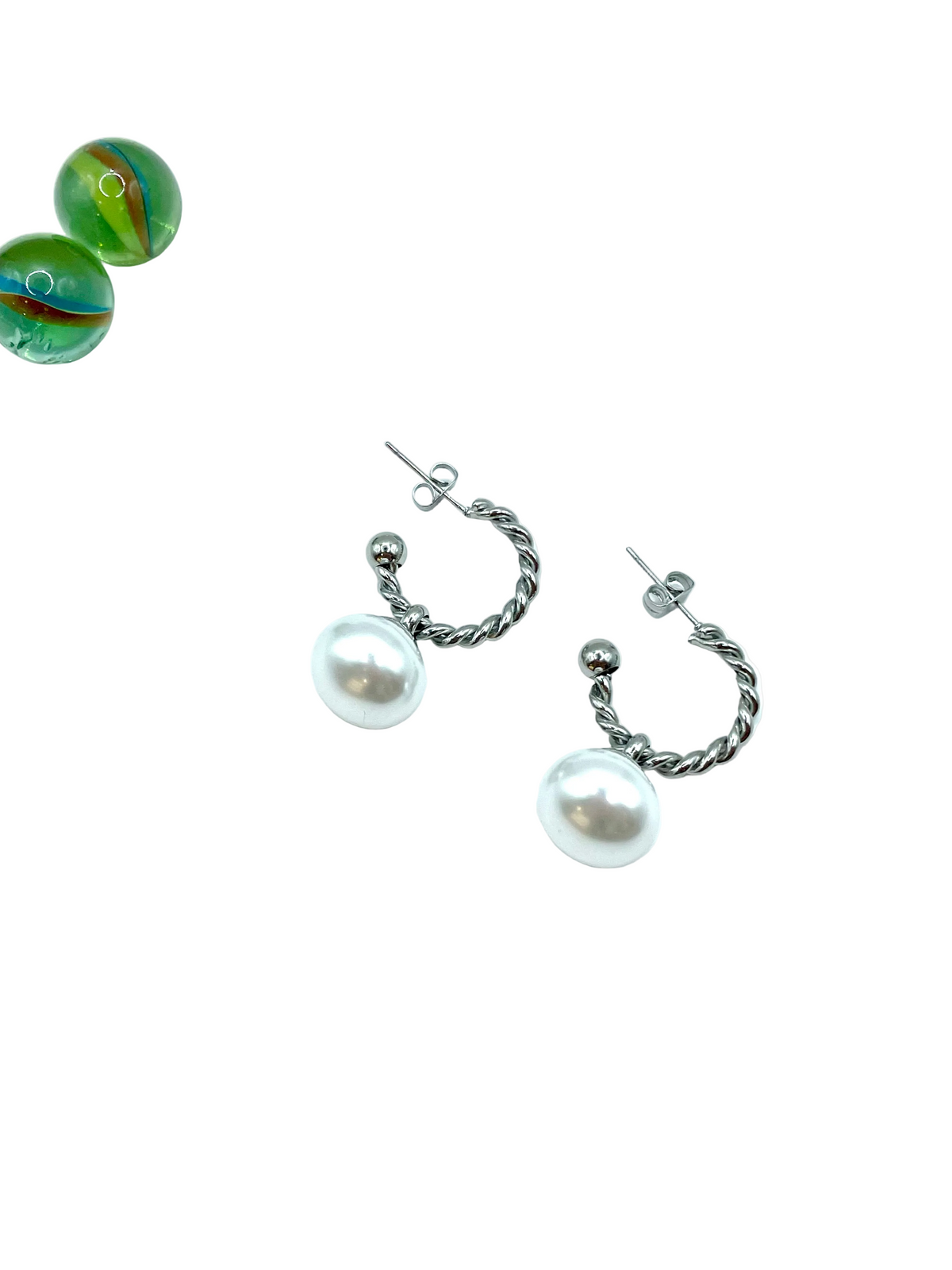 “Braided hoops big pearl” earrings