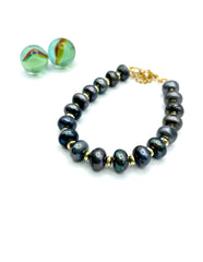 ΄΄Lucresia'' grey pearls bracelet