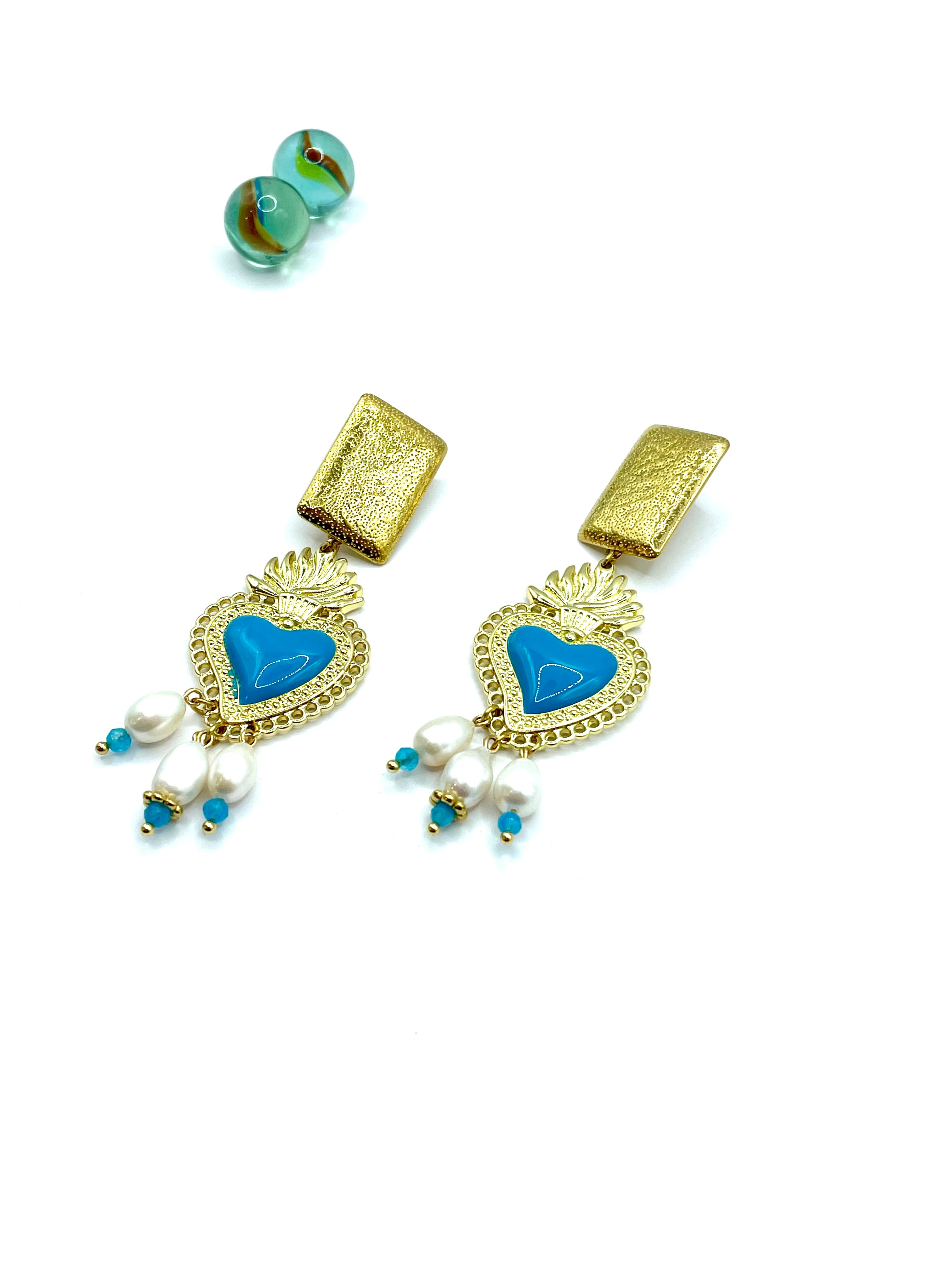 “Turquoise flaming heart” dangle earrings