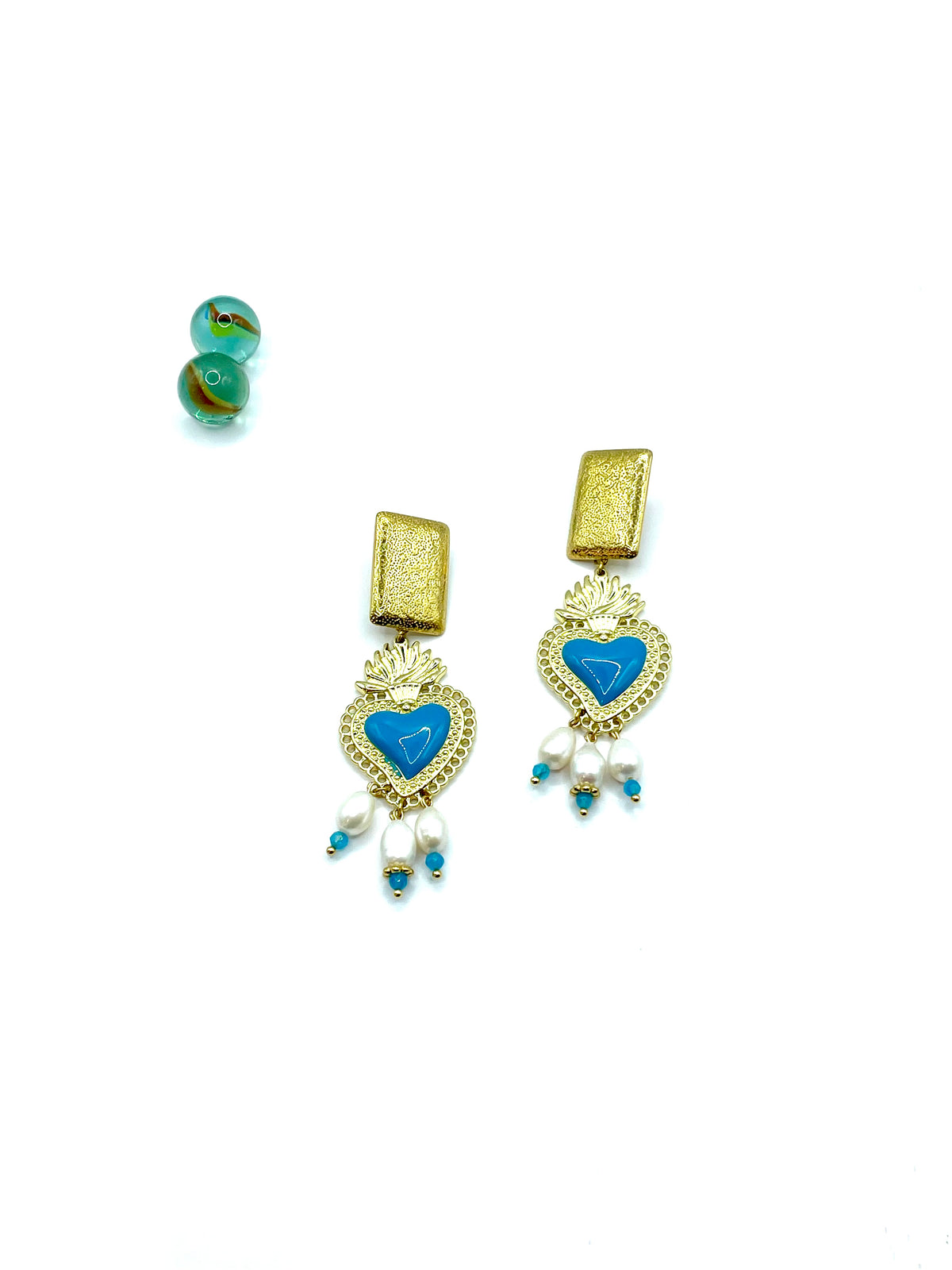 “Turquoise flaming heart” dangle earrings